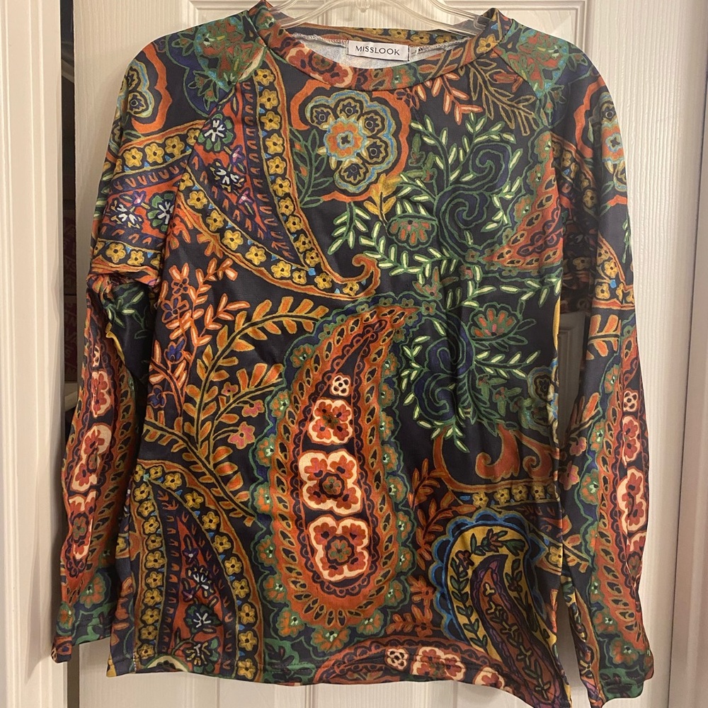 Patterned shirt with thin fleece lining.